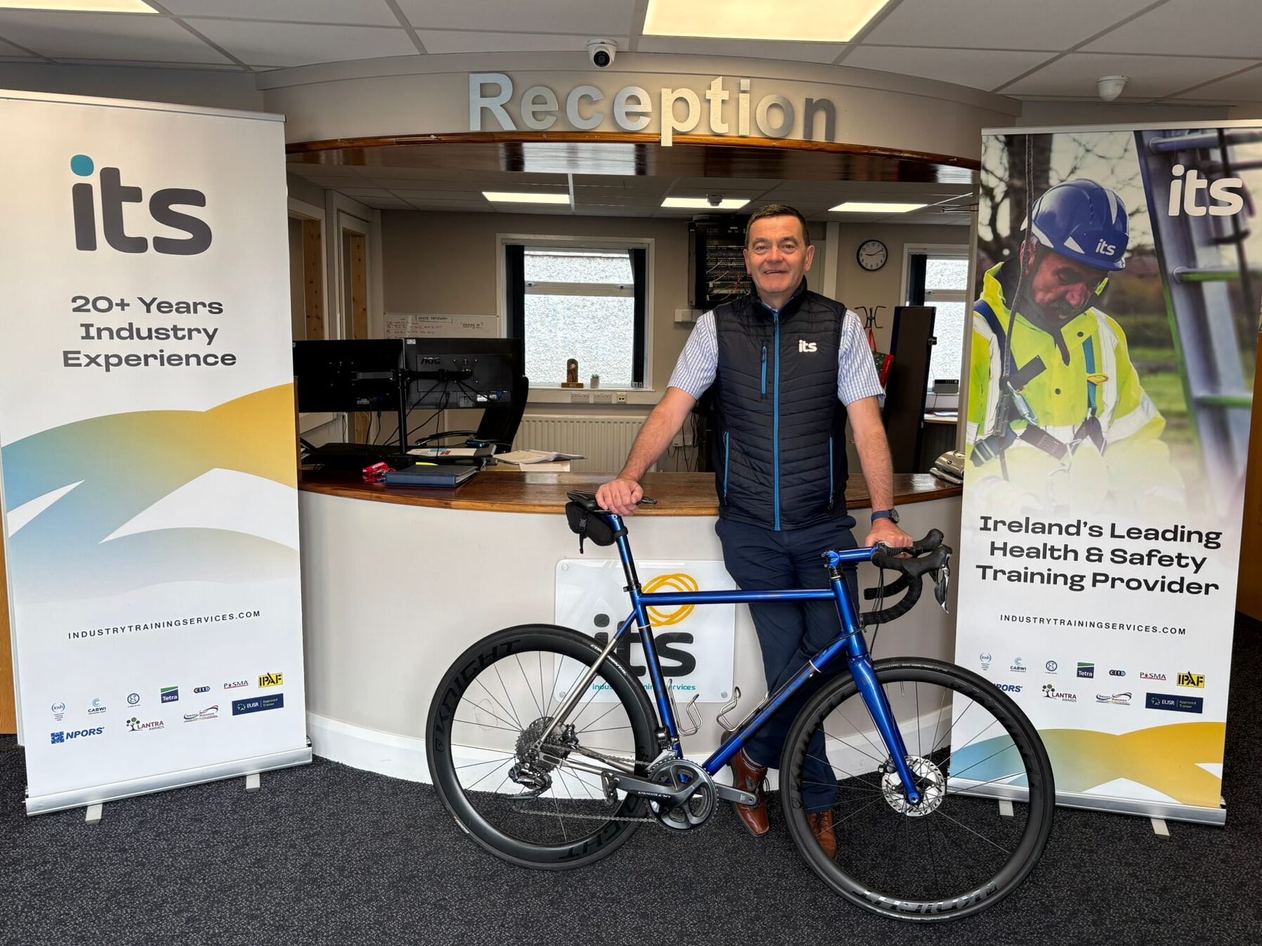 Image of Lighthouse Charity Northern Ireland Chair with his Bike