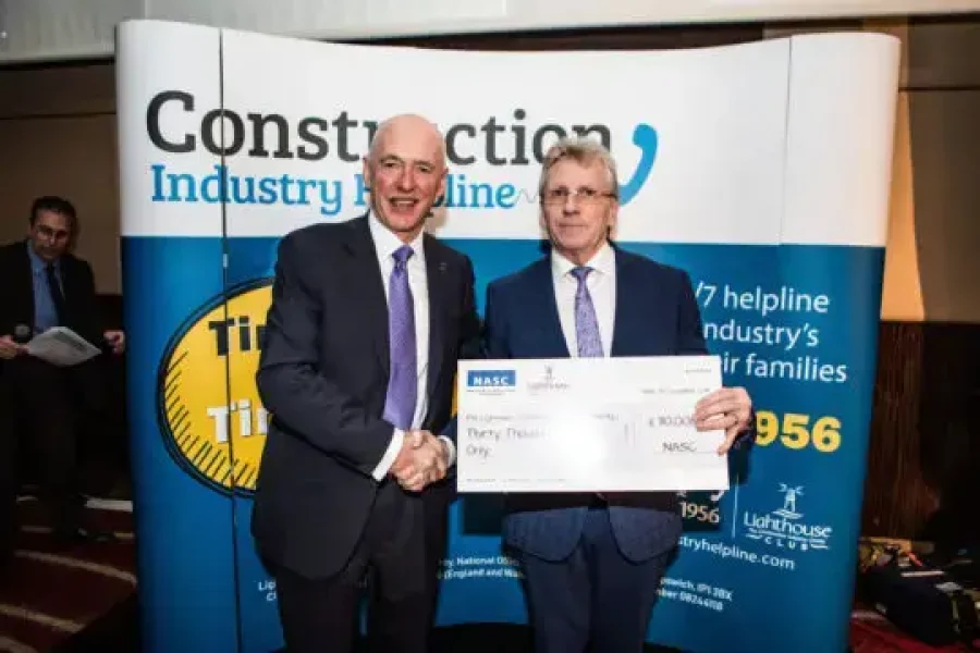 £30,000 cheque presented to  Lighthouse Club Chairman Cormac MacCrann by  Des Moore of NASC